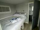 Lovely, very comfy double bed, clean towels for bathroom and hot tub use provided.